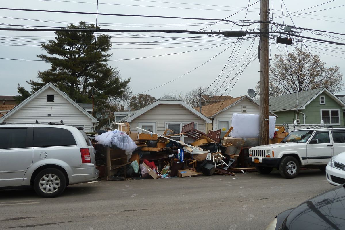 Junk piled at the curb during a property cleanout